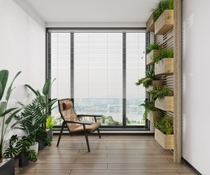 阳台是设计师为业主设置的一处远离闹市的清净之地，以极简的百叶窗阻挡调和强烈的光线，达到整体的平衡。