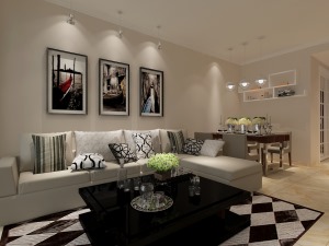 客厅以简约的黑白灰做基调把现代风这个词更形象的展现出来，加上软装搭配让整个客厅相得益彰
