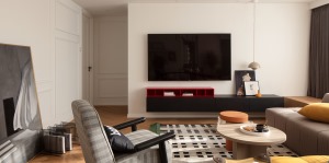纯色的背景墙与深色的电视柜产生强烈的视觉冲击感