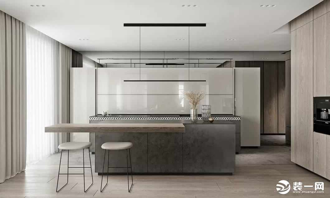 厨房区域采用木色地板铺设，纯白色的橱柜，显得空间清新舒适。吧台与中岛的结合为生活提供了充足的互动空间