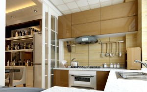 厨房的设计运用最新的板材，以烤漆金属面的质感衬托出奢华的氛围
