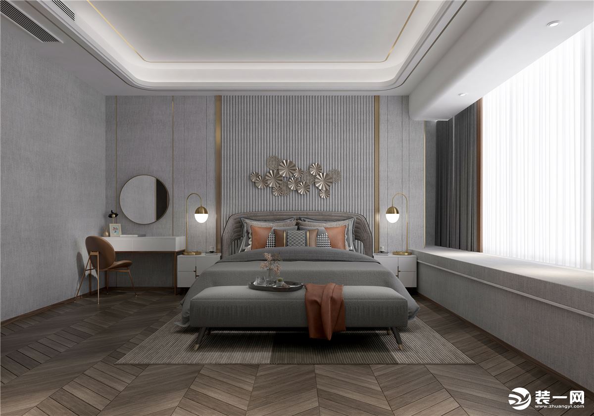 在卧室，是以橡木的实木木地板与浅灰色的墙布相结合，地板采用鱼骨贴的铺贴方式铺陈休憩空间；
