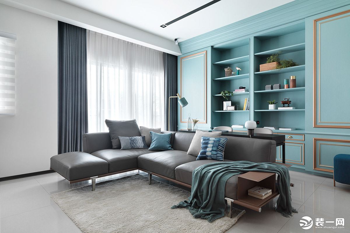 整个空间以蓝色为主调，局部以白色作为亮色来辅助，色彩跳跃，使空间简约却不简单。深灰色的沙发，不多不少