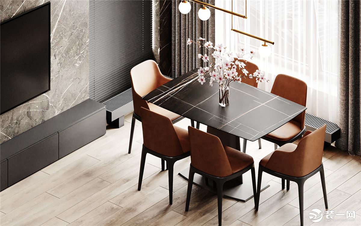 客餐厅的空间，客厅与餐厅位于同一空间，木制餐桌搭配木制餐椅，橙色色与黑色的交替既不单调又格外舒适。