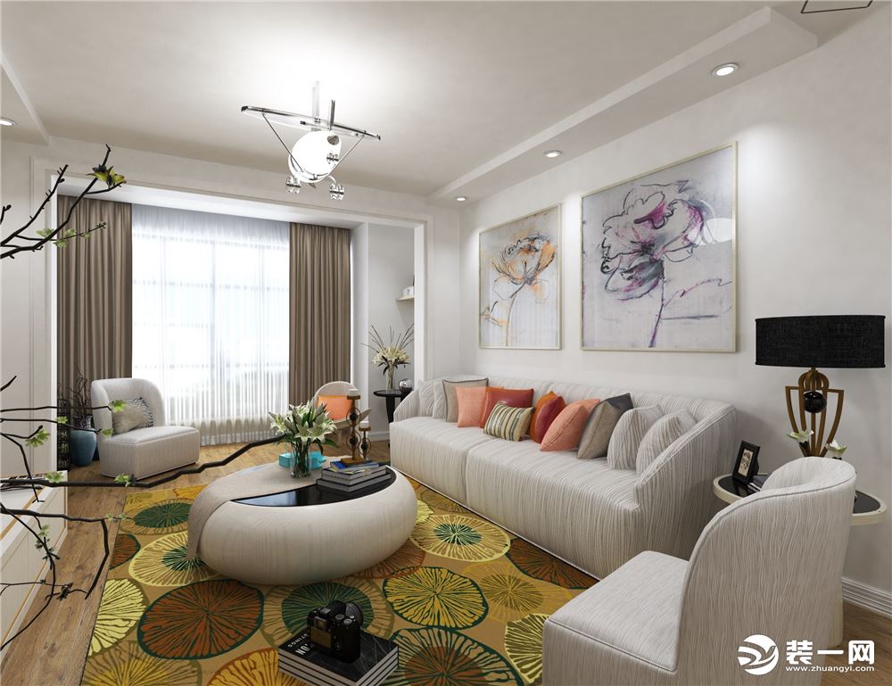 客厅色调以白色为主，简洁舒适。沙发背景墙放置了两幅挂画，简单大方。