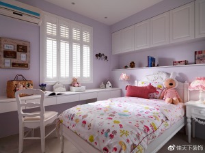 浅紫色的女孩房，以白色系柜体与家具，辅以童趣造型寝饰，呈现天真烂漫气息。