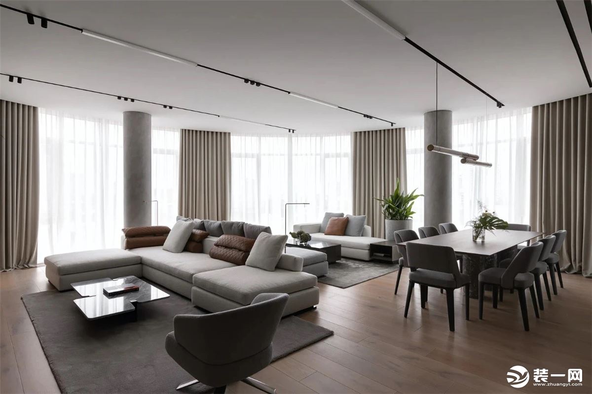 客厅以灰白色为主，与金属材质搭配，加入工业风元素，使得格调满满的，纯粹而惊艳。