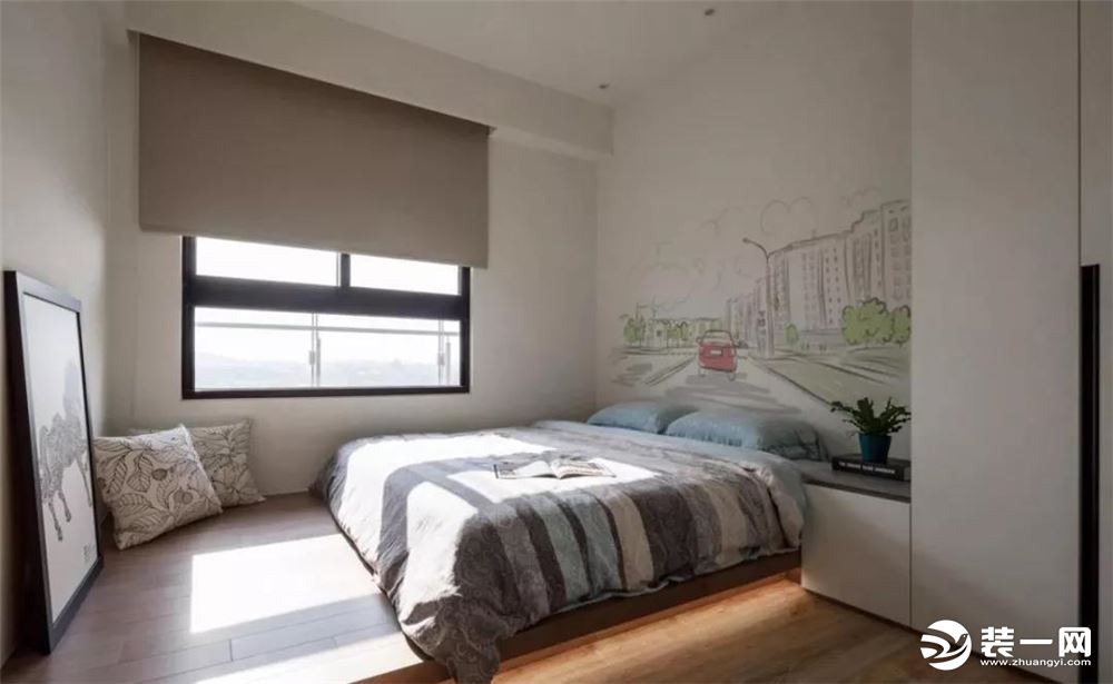 ▲素净的白墙基础，配合简单舒适的软装，以床头墙的都市手绘勾勒出轻松自在的休憩氛围。