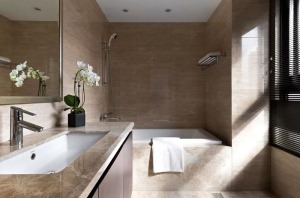 ▲棕色调的卫浴空间，搭配精致整洁的卫具，很有轻奢质感的小资情调。