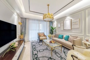 客厅以灰色、绿色和淡蓝色作为主色调，通过不同属性材质家具和饰品的组合，展示了美式的小优雅以及质感。
