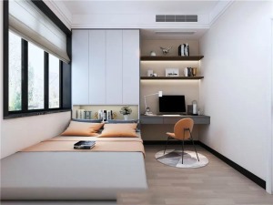 次卧灰白搭配的榻榻米及书桌，有橙色椅子及床上用品增加了空间的层次感。