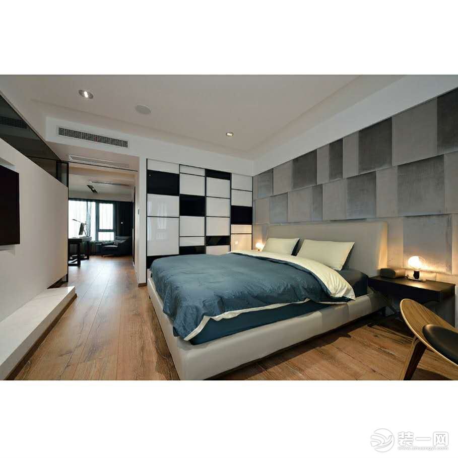 卧室采用软包背景墙深浅颜色搭配彰显个性。