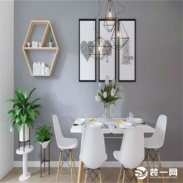 贴着墙壁摆放的简易餐桌椅，简单的几何木框置物架，三幅简单的北欧风画作，清新又自然，食欲都大增