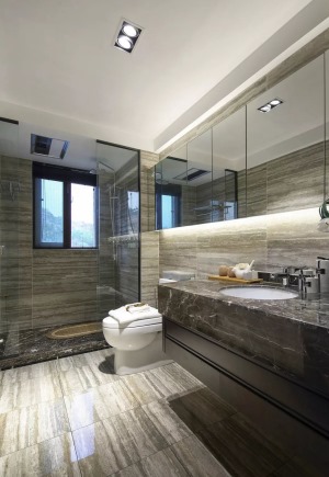 透明的玻璃隔断，多块镜子拼接的浴柜门，搭配大理石质感，让卫生间看起来有一种低调的奢华感