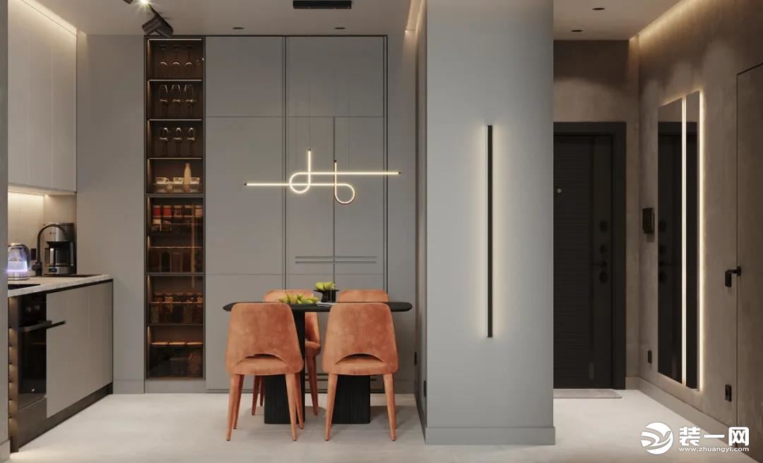 厨房空间的设计比较紧凑，高效的利用了空间，橙色的餐椅颜色出众