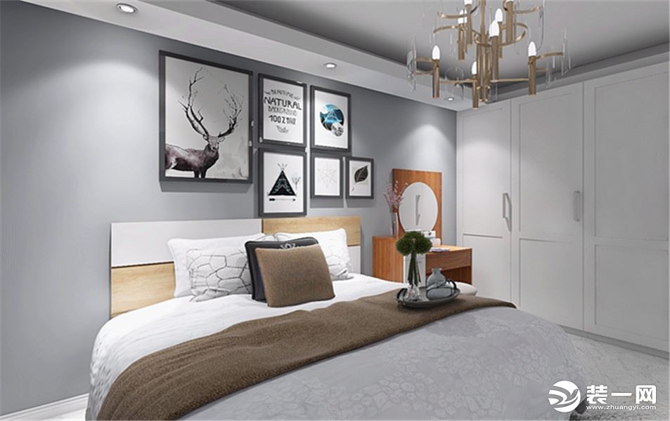 卧室使用纯灰色壁纸加上柔软舒适的床，给人温馨和谐的感觉。