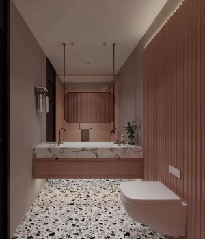 两个儿童房公用的粉色卫生间，双龙头的洗漱设计，能满足两人同时洗漱。悬空的收纳柜，能更好打扫地面。