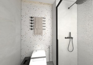 卫生间墙面采用隔离质感的大理石背景墙，丰富空间的层次感，黑色的移门边框和黑色的洗浴用品，也透露着质感