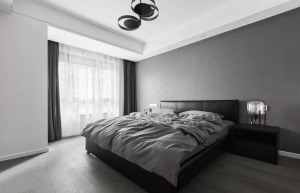 主卧，黑白灰覆盖整个空间更显低调大气，造型感灯具使得卧室