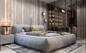床与背景墙相似颜色十分的温柔，一张复古式的地毯 给空间带来独特的韵味