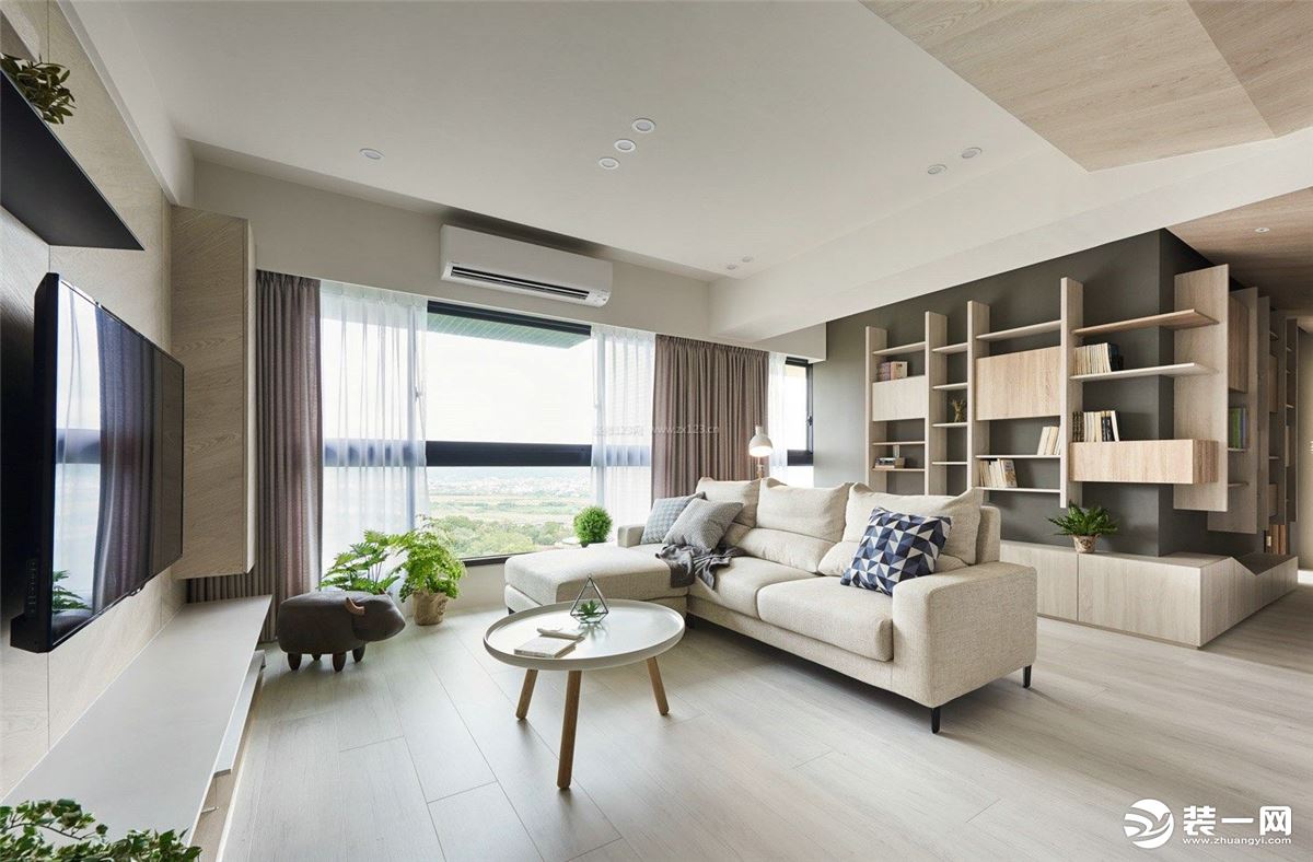 客厅整体采用明亮的色调，让整个环境看上去明朗宽敞舒适。