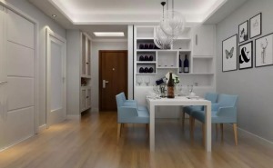 纯白的餐桌和壁柜相呼应，蓝色的餐椅作为点缀。现代简约风的墙面基本都以浅色为主，因此可以在墙上放一些装