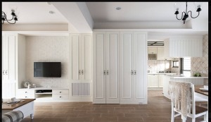 客厅里利用墙面及转角空间，做了大量的柜体，在保证背景墙和谐的同时大大的提高了家居的收纳特性