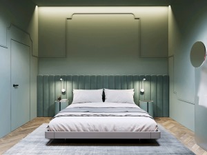 整个空间的薄荷绿，素色的床，简单造型的灯饰。
