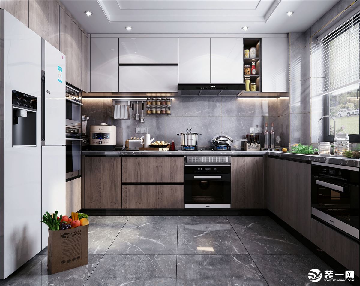 厨房内空间相对开敞，一体的柜子和家电的设计，现代感十足。