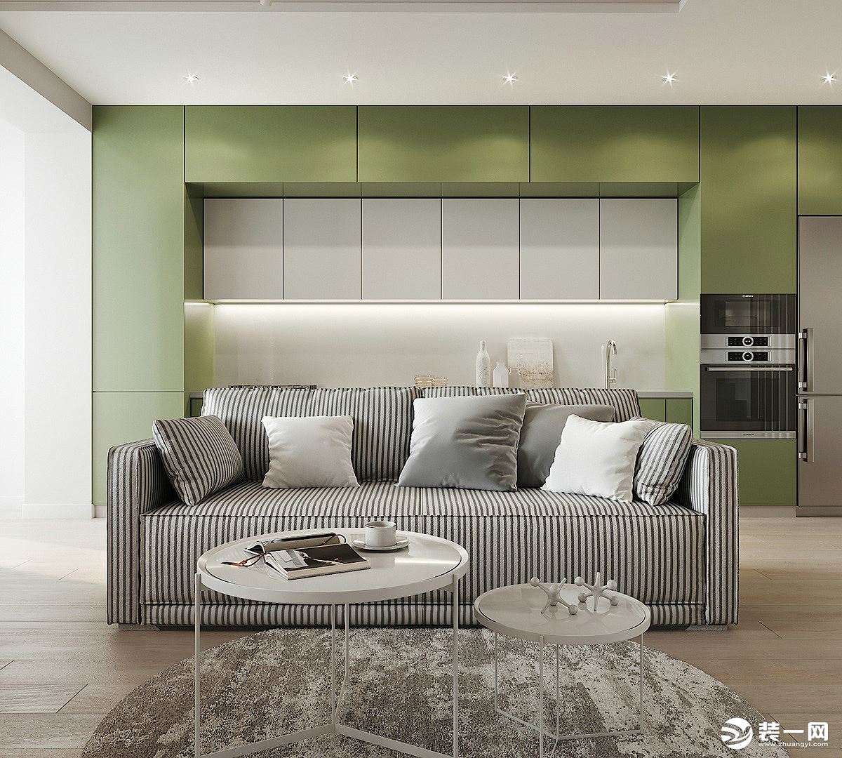 灰白色的沙发，搭配简易的小茶几，美观又实用。厨房嫩绿色的装潢，让整个空间流露出一丝清新的气息。