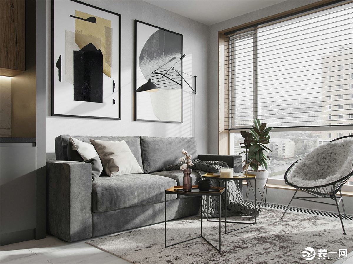 客厅灰色的沙发，同色系的墙漆，显得协调又统一。