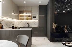 开放式的厨房显得更加通透，白色的瓷砖搭配黑色柜门，永不过时的经典黑白搭配。