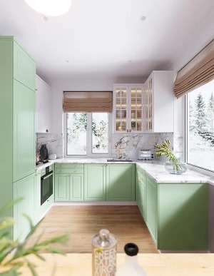 厨房的橱柜也是草绿色的，装上白色吊柜，吊柜还带有玻璃门的设计，整体显得更加实用而情趣。