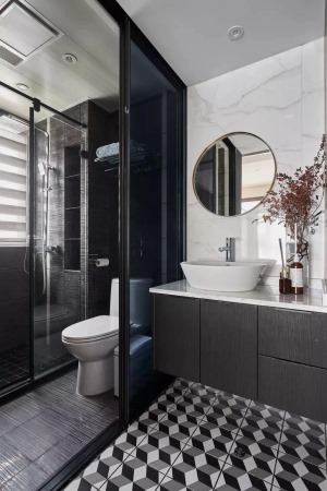 主卫的洗手台是放在了卫生间的门外，地面的创意地砖可以延伸空间视觉感。