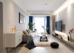 客厅整体空间现代简洁，搭配上闲适轻松的软装布置，带来的是年轻优雅的生活仪式感。