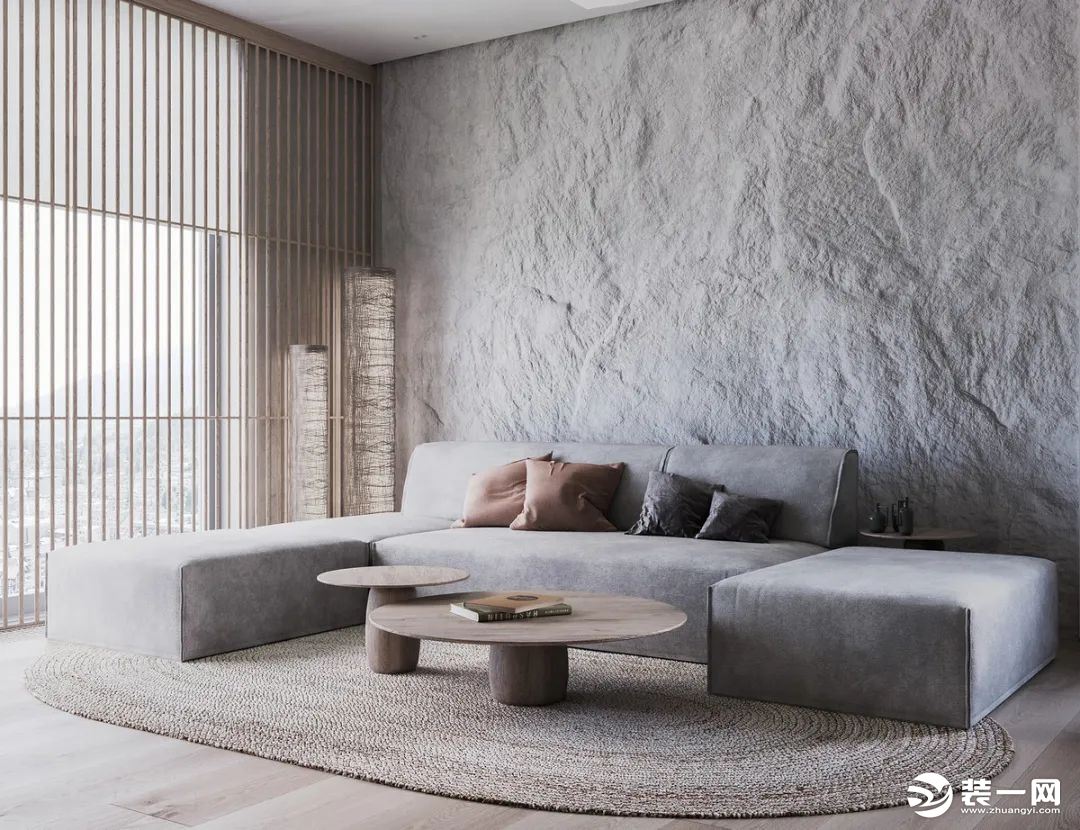 客厅整体简约范的设计空间，沙发墙以粗糙的灰色水泥墙质感设计，营造出一种朴素原始的自然设计感，木饰板地