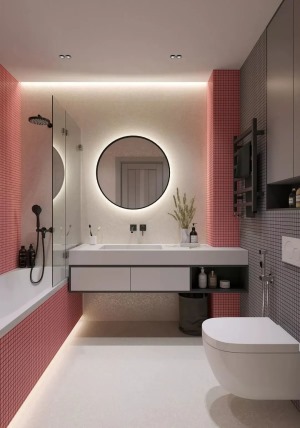 主卫空间设置了浴缸、洗手盆与马桶，墙面以粉色、灰色的马赛克砖粘贴，洗手盆是大理石材质的定制设计，墙面