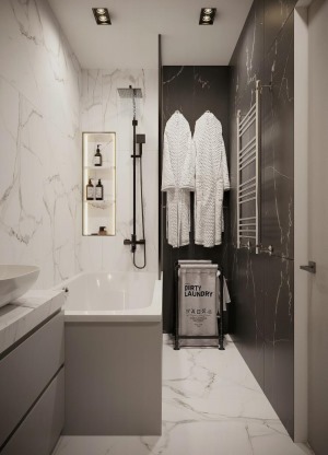 卫浴间的装饰比较简单，白色的瓷砖上墙，与地砖相互呼应，视觉效果更好。