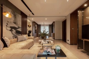 客厅与餐厅空间相邻的设计，整个大厅区域的墙面加入了较多的胡桃木材质，让空间显得更加稳重端庄而高级。