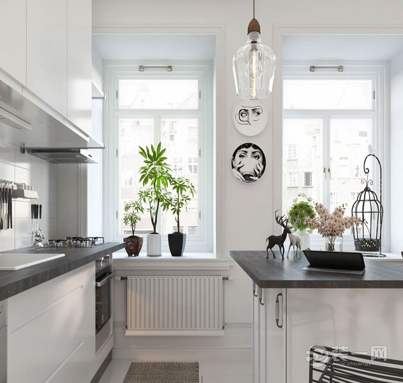 厨房：开放式厨房更节约空间，瓷黑色吧台面也更体现出极简约主义风格的时尚品质。
