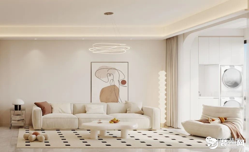 以奶油白为主调的客厅与透过开阔阳台进入室内的柔和自然光，呈现出不用层次的白，简单却温馨。