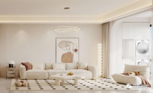 以奶油白为主调的客厅与透过开阔阳台进入室内的柔和自然光，呈现出不用层次的白，简单却温馨。