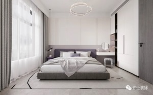 卧室整体延续空间的简约美感，而设计师以“内核”作为设计主线，在有限的区域内创造环环相扣的层次感。