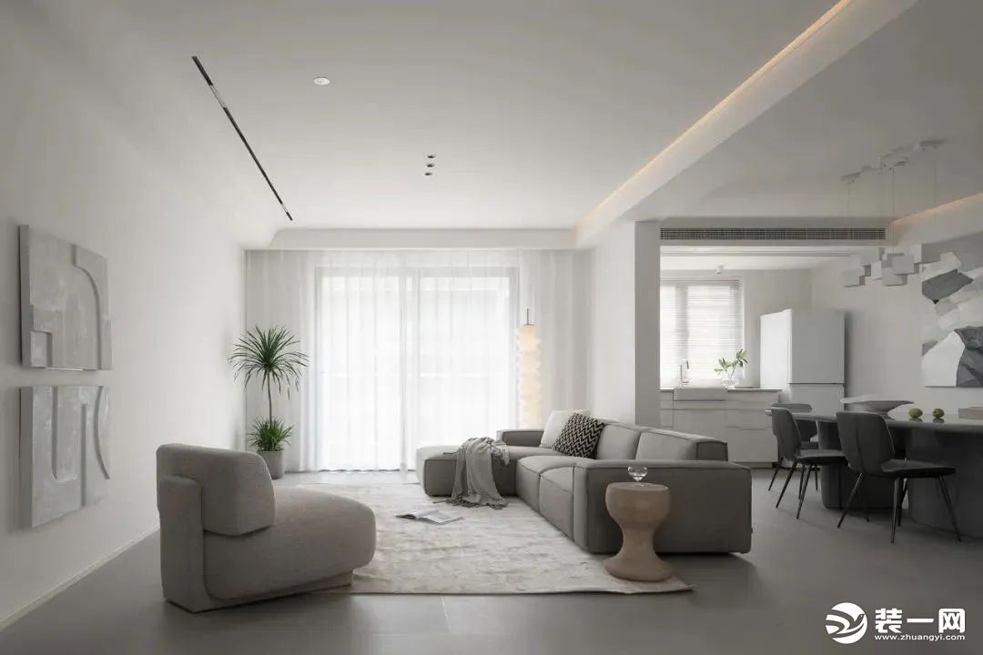 客厅，使用白灰两种色系来晕染简约格调，设计客餐一体化的开放式布局，落地窗使光源铺叙在客厅之间，让空间