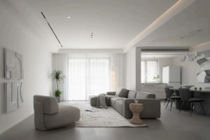客厅，使用白灰两种色系来晕染简约格调，设计客餐一体化的开放式布局，落地窗使光源铺叙在客厅之间，让空间