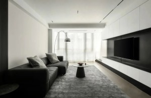 客厅，以基础的黑白灰为主色调，打造干净纯粹的空间感，无主灯设计+磁吸轨道灯达到照明效果