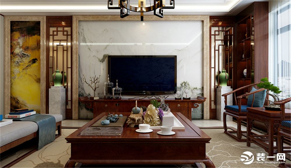 客厅电视背景墙以中国传统的山水画为背景，营造了极具中国韵味的生活空间。