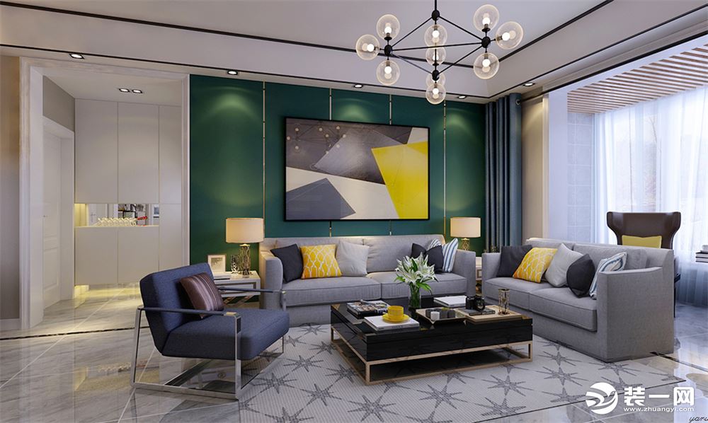 客厅灰色柔软舒适的布艺沙发，沙发背景墙用绿色的壁纸，搭配个性的挂画，格外显眼。