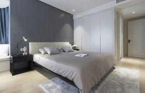 简洁舒服是整个卧室设计的主要方向，设计师在空间中通铺原木色地板，让整个卧室更温润静谧