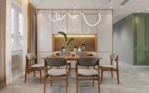 餐桌以随意自由的方式，横陈在空间里，呈现一个交互形的客餐厅空间。